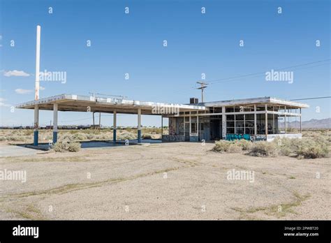 An Abandoned Gas Station Sits By The Railway Tracks In Yermo In