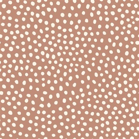 Premium Vector | Hand drawn seamless pattern. dots on brown background ...