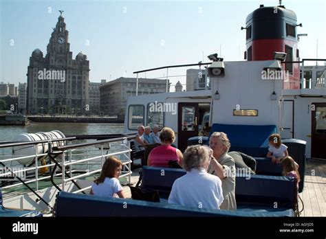 Tourists Aboard Royal Iris A Mersey Ferry Skyline Of Liverpool England