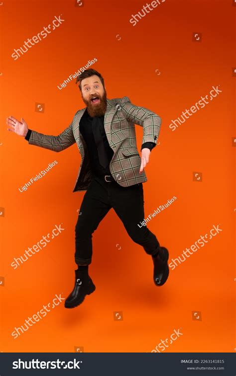 Excited Stylish Man Jumping Looking Camera Stock Photo 2263141815 ...