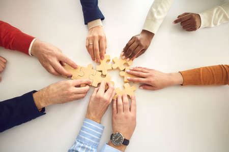 Multiracial Business Team Assembling Puzzle Multiethnic People Putting