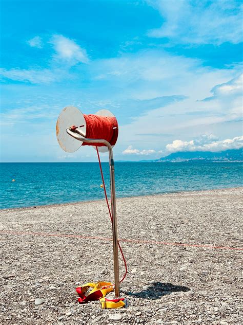 Red Flag on Beach · Free Stock Photo