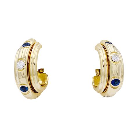 Piaget gold earrings, "Possession" collection.