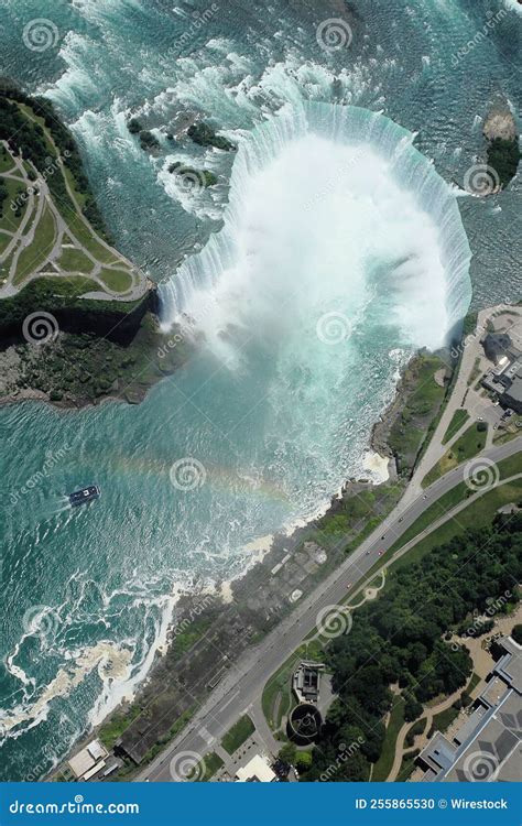 Vertical Aerial View Of The Niagra Falls With A Rainbow Stock Photo