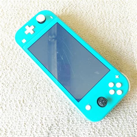 【傷や汚れあり】7t3601gr 任天堂nintendoニンテンドー スイッチライトswitch Lite 本体 ターコイズ Hdh