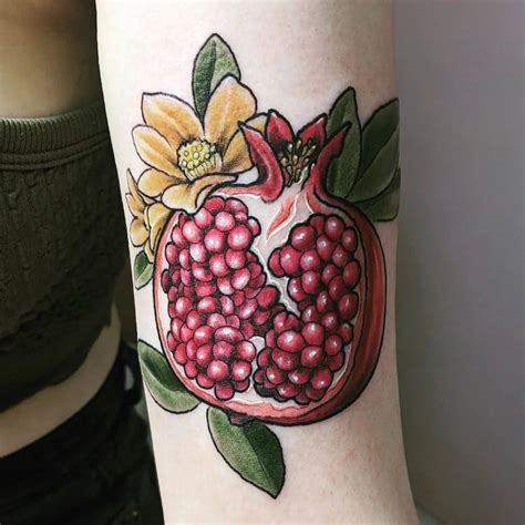 20 Beautiful Pomegranate Tattoo Ideas for Women - Mom's Got the Stuff