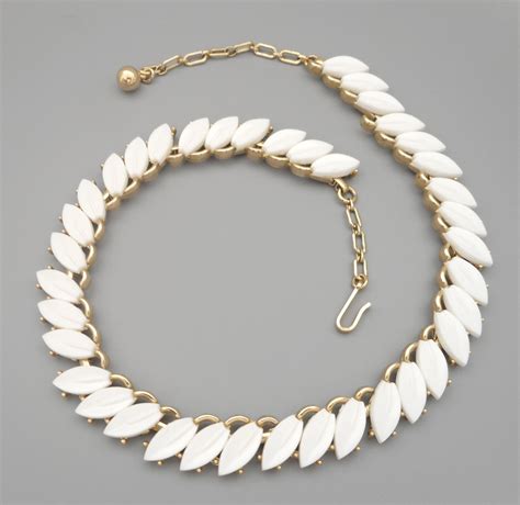 Sold Vintage Gold Tone Signed Crown Trifari White Thermoset Leaf