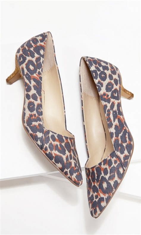 Leopard Print Kitten Heel Pump With A Pointed Toe And Stacked Heel