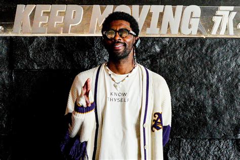 Kyrie Irving Dons Philosophic Shirt & Sneakers at Anta Museum in China – Footwear News