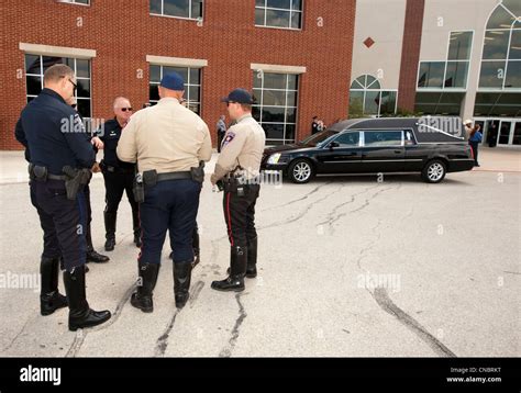 Agents Beside Hearse At Funeral For Police Officer Killed In The Line