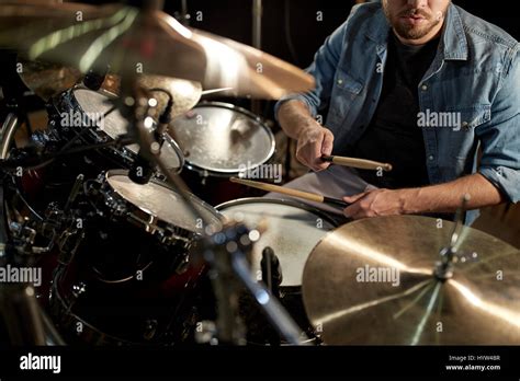 Male Musician Playing Drums And Cymbals At Concert Stock Photo Alamy