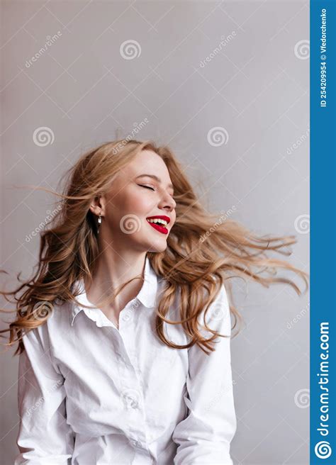 Inspired Blonde Woman Posing With Closed Eyes Studio Shot Of Relaxed