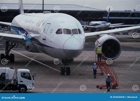 Airplane Parked On A Tarmac At An Airport In Narita Japan Editorial