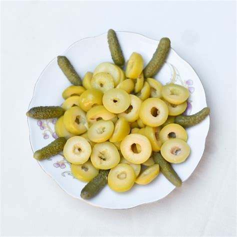 Premium Photo Pickled Olives Cucumber Lemon And Pepper Pickled