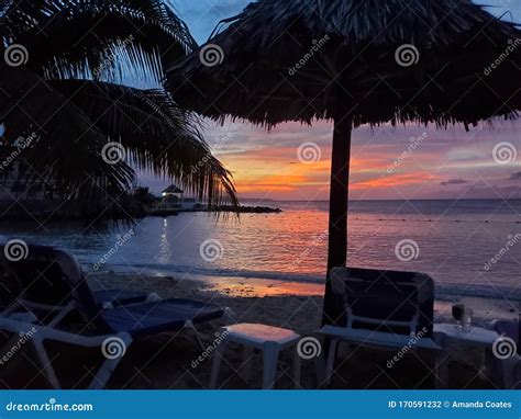 Beach sunrise in Jamaica stock photo. Image of sunrise - 170591232