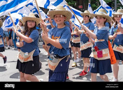 New York New York May 22 Participants Holding Israeli Flags And Signs March Up Fifth Avenue