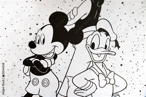 Disney coloring magazine. Mickey Mouse, Goofy and Donald Duck in their ...