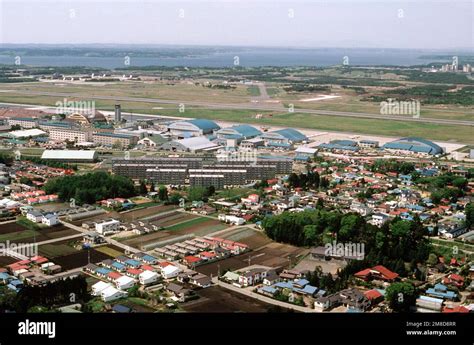 An Aerial View Of A Portion Of The Base And The Surrounding City Of