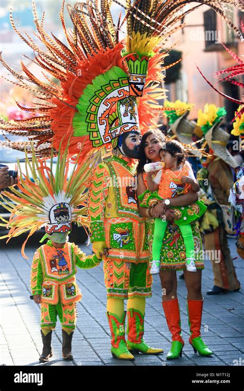 A mexican family dressed with traditional mexican folk costumes during ...