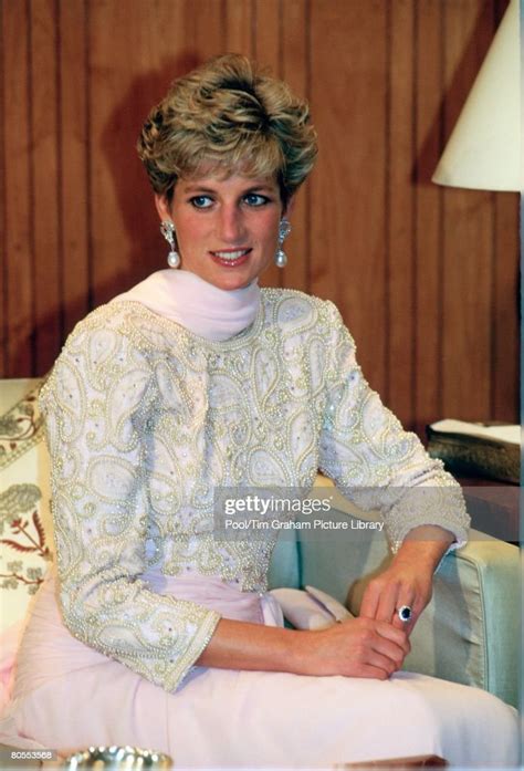 Diana, Princess of Wales wears a dress designed by fashion designer ...