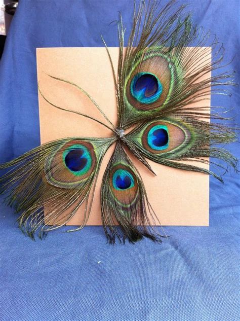 Pin by Dori Arrabal on toral en tren in 2023 | Feather crafts, Peacock ...