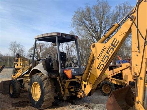 New Holland Ford 555E Backhoe Loader Witcher Farms