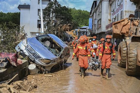 Southern China paralysed after record rains, floods