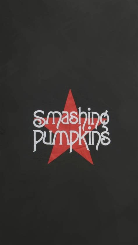 The Smashing Pumpkins Logo Is Shown On A Black Background With Red And White Stars