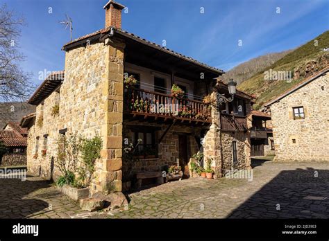 Beautiful village of Barcena Mayor with the traditional stone houses in the Cantabria mountains ...