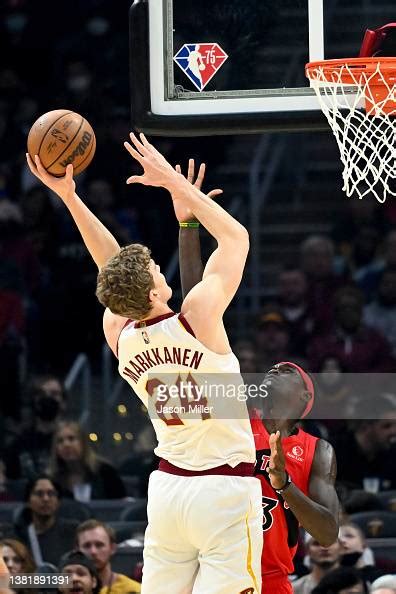 Lauri Markkanen of the Cleveland Cavaliers shoots over Pascal Siakam ...