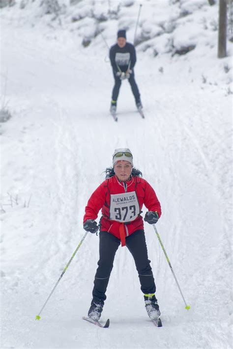 Cross Country Skiing Woman Followed by a Man Editorial Image - Image of person, competition ...