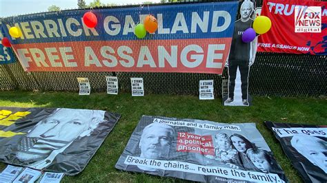 Julian Assange Supporters Demand Charges Be Dropped In Vigil Outside