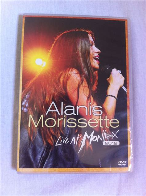 A Dvd With An Image Of A Woman Singing Into A Microphone