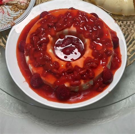 There Is A Dessert On The Plate With Raspberries