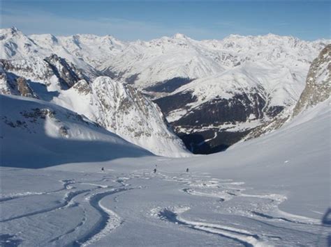 Adamello Ski Mountaineering Pisganino Skiing Down Towards Ponte