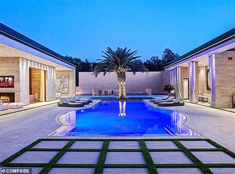 Kylie Jenner Poses In A Black Bikini Top As She Says She Is Enjoying Another Pool Day Daily