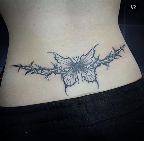 butterfly tramp stamp with thorns in 2022 | Tramp stamp, Geometric ...