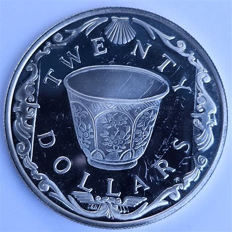 SILVER, QUEEN ELIZABETH 2O DOLLAR COIN | Property Room