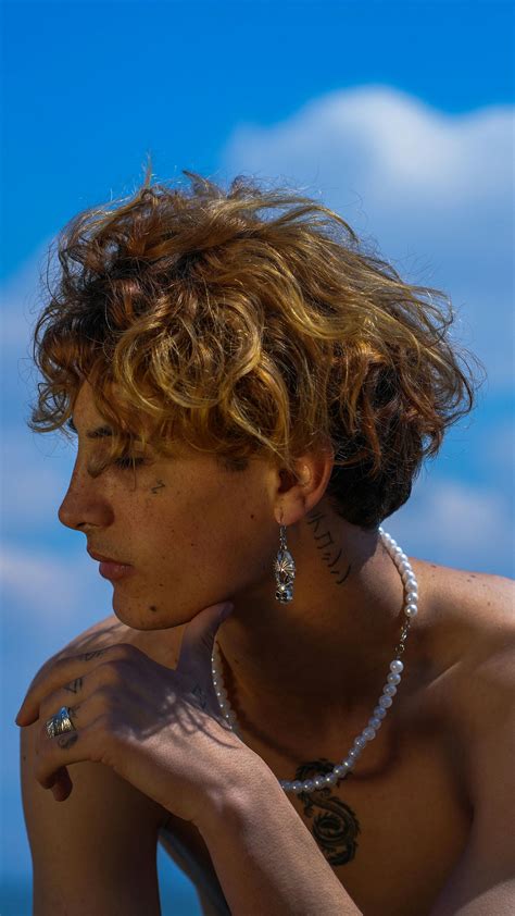 A Man Wearing Silver Chain Necklace · Free Stock Photo
