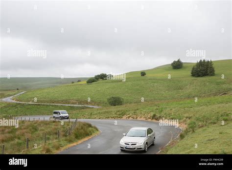 Vehicles Driving Along The Mountain Road Through Elan Valley In Wales