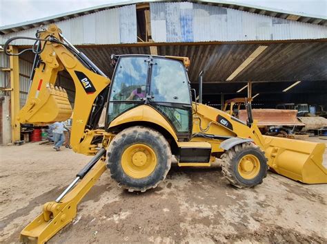 Retroexcavadora Caterpillar E Proveedor Per Precio De Venta