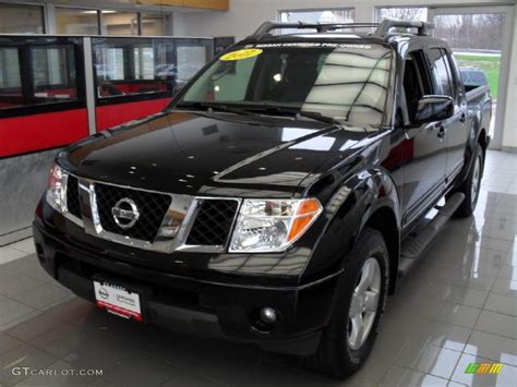 Super Black Nissan Frontier Le Crew Cab X Photo