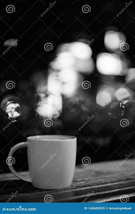 Coffee Cup On Wooden Table In Restaurant At Night Stock Image Image