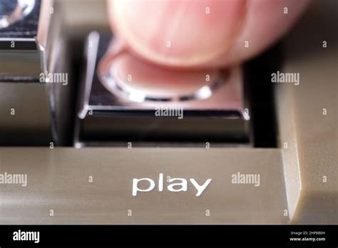 Finger Pressed A Play Button Of A Vintage Tape Recorder Macro Stock