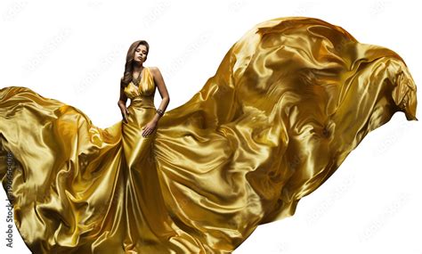 Fashion Model Golden Fly Dress Elegant Woman In Fluttering Gold Gown