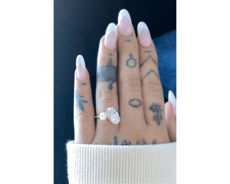 Ariana Grandes 50 Tattoos And Their Meanings Fabbon