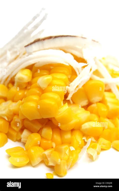 Corn With Sliced Coconut On White Background Stock Photo Alamy