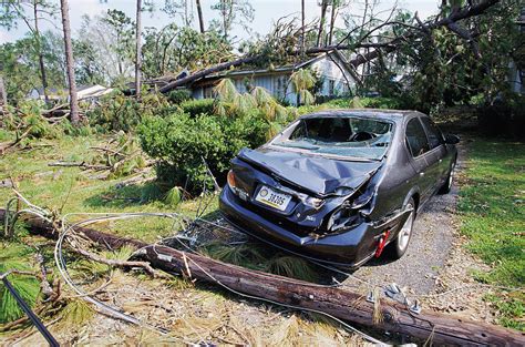 Crushed Car After Hurricane Katrina Photograph By David Hay Jones