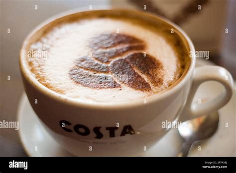 Illustrative Image Of A Costa Coffee Cappuccino And The Three Bean Logo