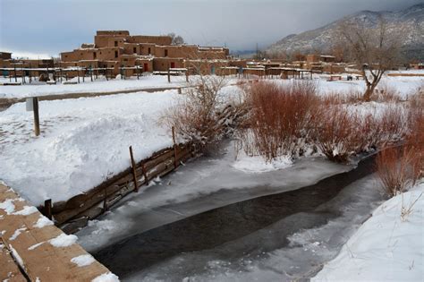 The Wonder Of Taos Pueblo In Winter Taos Pueblo Taos New Mexico Pueblo